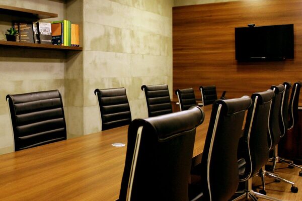 A boardroom laid out for a governance meeting